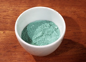 Copper carbonate Print: Green solid in a crucible