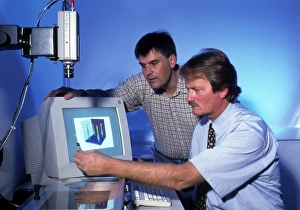 DNA BioChip inventors examine test results DNA BioChip inventors examine test results