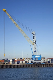 Prints of Dockside crane. These cranes are designed to move containers between lorries and ships. The container system is an efficient means of transporting many and varied types of cargo Images Dated 2008 July: Dockside Crane Print