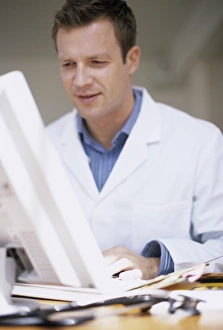 Framed Print : Doctor typing notes Print Framed Print : Doctor typing notes Print