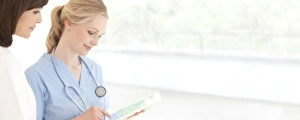 Digital Healthcare Solutions Prints: Doctors using a tablet computer F008 / 3059