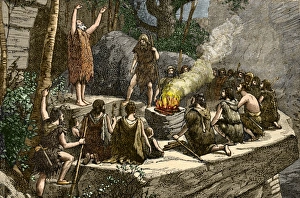 Prints of Early use of fire. Historical artwork of early humans gathered around a fire. There is evidence for the controlled use of fire over one million years ago Images Dated 2005 March: Early use of fire Print