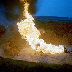 Prints of Fire-retardant testing. Object (centre) being doused in flames in order to test its ability to withstand extreme heat and fire Images Dated 2008 December: Fire-retardant testing Print