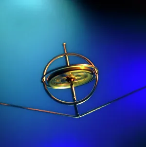 Gyroscope spinning on a piece of string Gyroscope spinning on a piece of string