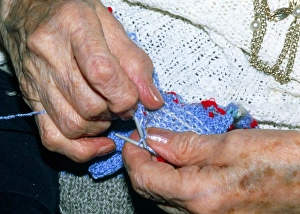 Hands knitting affected by osteoarthritis Hands knitting affected by osteoarthritis