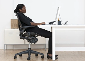 Prints of MODEL RELEASED. Incorrect seated posture Images Dated 2012 November: Incorrect Seated Posture Print