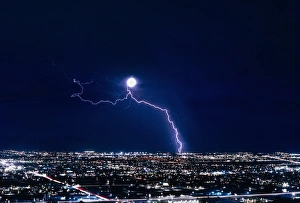 Lightning strike at night in Tucson, Arizona, USA Lightning strike at night in Tucson, Arizona, USA