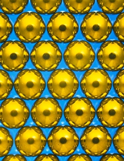 Macrophotograph of ball bearings suspended in oil Macrophotograph of ball bearings suspended in oil