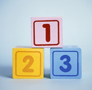 Prints of Number blocks. Toy blocks depicting the numbers 1, 2 and 3. These blocks are used to teach young children and people with dyslexia how to solve mathematical problems Images Dated 2007 November: Number Blocks Print: Wooden Toy Blocks Depicting Numbers 1, 2 and 3