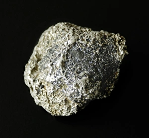 Prints of Platinum nugget. Platinum is a rare precious metal, sometimes found in this nugget form in nature. It is used in the chemical industry as a catalyst, and in jewellery Images Dated 2008 February: Platinum Nugget Print