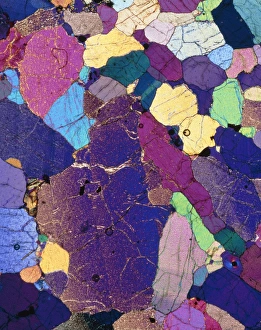 Polarised LM of a thin section of monzonite rock Polarised LM of a thin section of monzonite rock