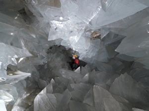 Prints of MODEL RELEASED. Pulpi geode, Almeria, Spain. Geologist inside the Pulpi geode, the largest geode ever discovered. Geodes are rocks that are hollow in the centre Images Dated 2012 February: Pulpi Geode Print