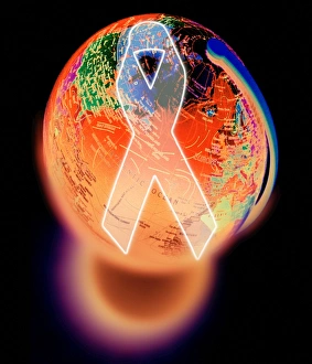 Red ribbon and a globe symbolising AIDS awareness Red ribbon and a globe symbolising AIDS awareness