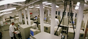 Researchers sequencing human DNA in a laboratory Researchers sequencing human DNA in a laboratory