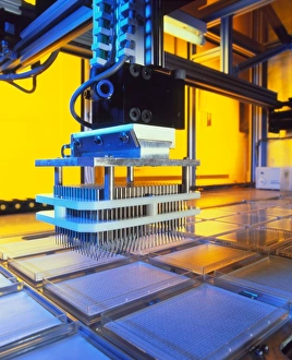 Robot loading DNA in automated genome mapping Robot loading DNA in automated genome mapping