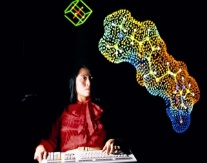 Scientist w/computer 3D image of complex molecule Scientist w/computer 3D image of complex molecule
