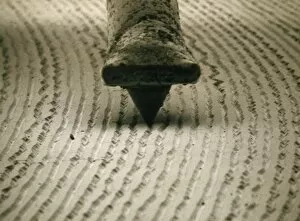 Images Dated 30th July 2002: SEM of diamond stylus in groove of LP record H100 / 0104
