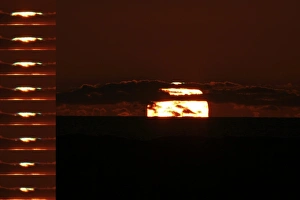 Setting Sun Print: Coloured Rays Over Clouds