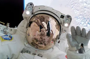 Space Prints: Return to Flight Spacewalk Print: Astronaut Soichi Noguchi waving