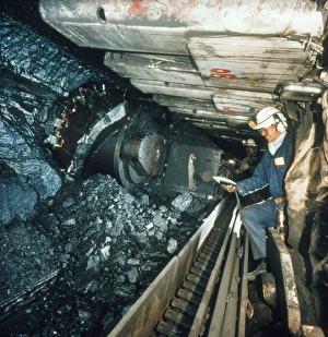 Technician measures noise levels in a coal mine Technician measures noise levels in a coal mine