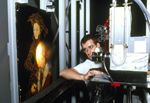 Technician uses infra-red scanner on forged art Technician uses infra-red scanner on forged art