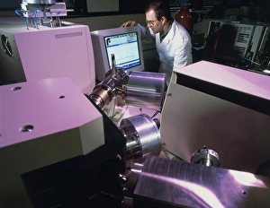Technician uses an isotope ratio mass spectrometer Technician uses an isotope ratio mass spectrometer