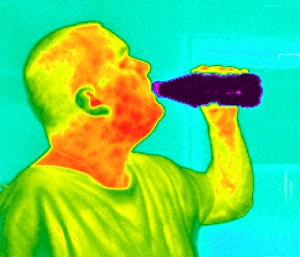 Thermogram of a man drinking from a bottle Thermogram of a man drinking from a bottle