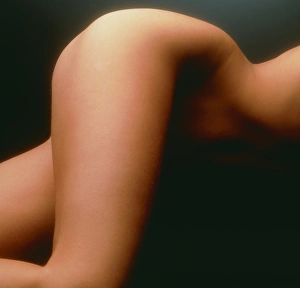 Thigh, abdomen and waist of a woman lying down Thigh, abdomen and waist of a woman lying down