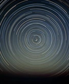 Time-exposure photo of polar star trails Time-exposure photo of polar star trails