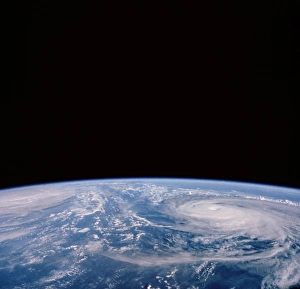 Typhoons Odessa and Pat, seen from Shuttle 51-I Typhoons Odessa and Pat, seen from Shuttle 51-I