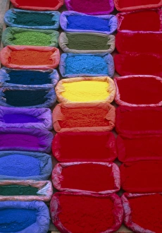 View of several bags of coloured dye powder View of several bags of coloured dye powder