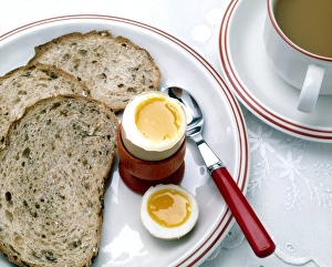 View of a healthy breakfast of egg, bread and tea View of a healthy breakfast of egg, bread and tea