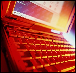 View of a laptop computer keyboard and screen View of a laptop computer keyboard and screen