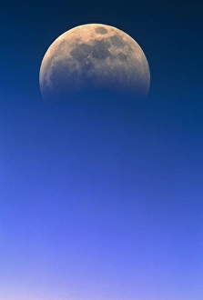 Moon Phases Prints: View of a partial lunar eclipse