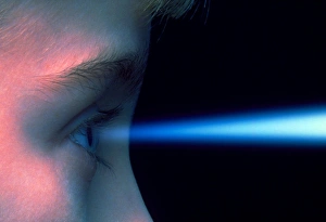 Vision: blue light entering the eye of a child Vision: blue light entering the eye of a child