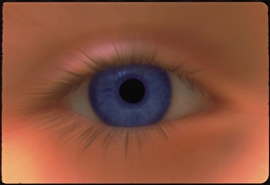 Zoom effect image of a young girls blue eye Zoom effect image of a young girls blue eye