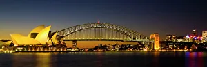 Australia, New South Wales, Sydney. Sydney Harbour bridge and the opera house viewed at dusk Australia, New South Wales, Sydney. Sydney Harbour bridge and the opera house viewed at dusk