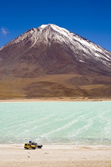 Bolivia, Southern Altiplano, Laguna Verde. Tourist trip 4x4s parked near Laguna Verde Bolivia, Southern Altiplano, Laguna Verde. Tourist trip 4x4s parked near Laguna Verde