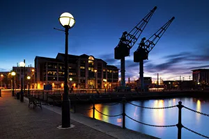 England, Greater Manchester, Salford Quays. Cranes overlooking Ontario Basin part of England, Greater Manchester, Salford Quays. Cranes overlooking Ontario Basin part of