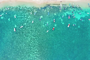 Africa Collection: Aerial by drone of boats in the turquoise water of lagoon front of Mont Choisy beach