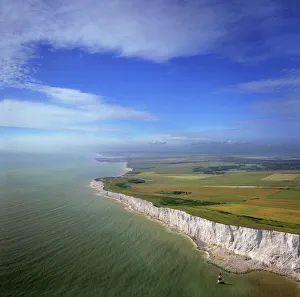 Aerial image of chalk cliffs and lighthouse at Beachy Head, near Eastbourne Aerial image of chalk cliffs and lighthouse at Beachy Head, near Eastbourne
