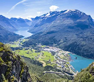Aerial view of hikers on suspension bridge on Via Ferrata high up above the fjord Aerial view of hikers on suspension bridge on Via Ferrata high up above the fjord