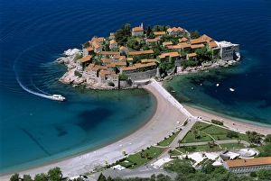 Aerial view over the island and beaches, Sveti Stefan, The Budva Riviera, Montenegro Aerial view over the island and beaches, Sveti Stefan, The Budva Riviera, Montenegro