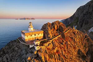Images Dated 28th March 2023: Aerial view of Punta della Guardia lighthouse on top of a cliff on the island of Ponza