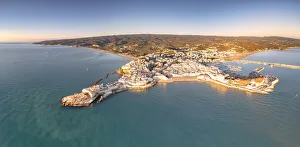 Aerial view of Vieste at sunrise in summer, Foggia province, Gargano National Park Aerial view of Vieste at sunrise in summer, Foggia province, Gargano National Park