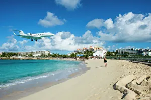 Airplane flying in the Princess Juliana International Airport of Maho Bay, Sint Maarten Airplane flying in the Princess Juliana International Airport of Maho Bay, Sint Maarten