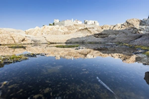 The ancient fortified citadel reflected in the blue sea, Calvi, Balagne Region, Corsica The ancient fortified citadel reflected in the blue sea, Calvi, Balagne Region, Corsica
