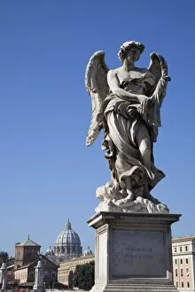 Angel Statue Collection: Angel statue on Ponte Sant Angelo (Bridge of Angels), with the dome of the Vatican in distance