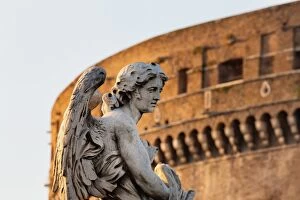 Angel Statue Collection: Angel statue on Ponte Sant Angelo with Castel Sant Angelo, Rome, Lazio, Italy, Europe