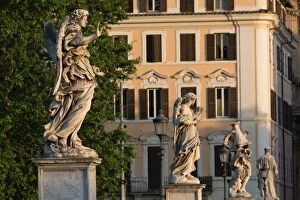 Angel Statue Collection: Angel statues on Ponte Sant Angelo with grand house behind, Rome, Lazio, Italy, Europe